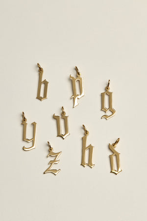 Large Gothic Letter Necklace | 9K Yellow Gold | Natasha Schweitzer